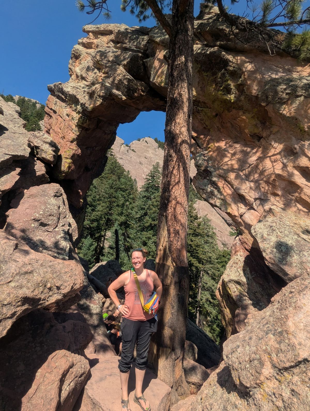 Hiking through a rock arch near Boulder, Colorado