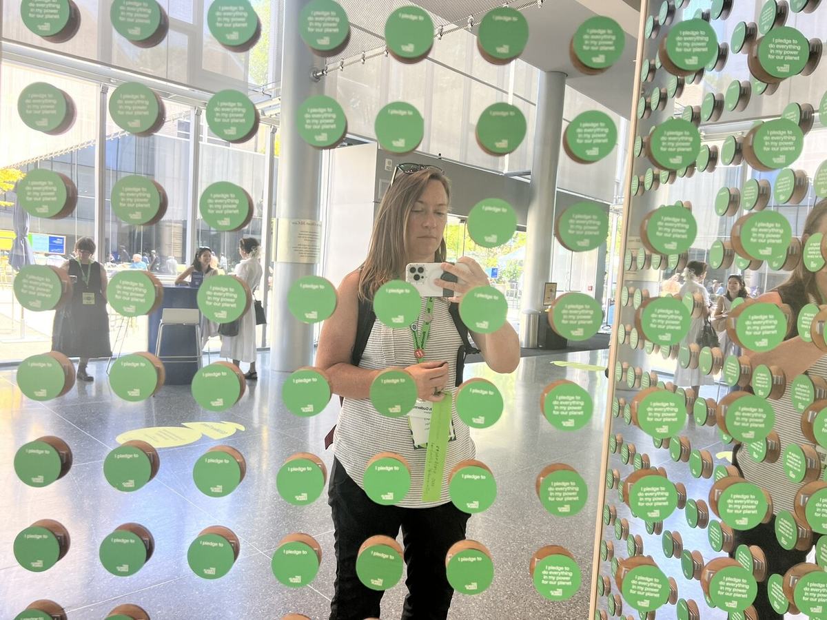 A wall of Climate Pledges.