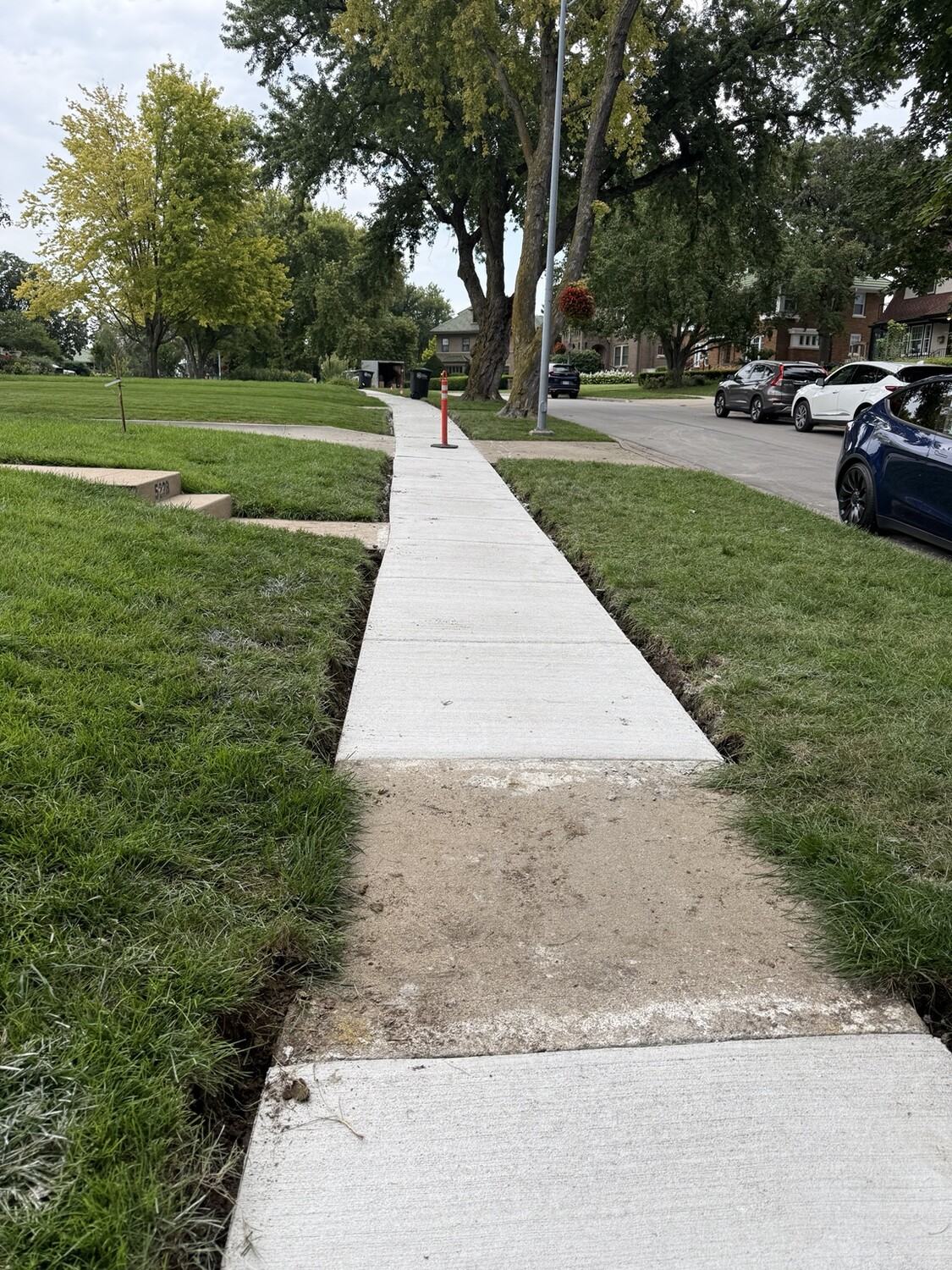 Final view of the current status of the sidewalk.